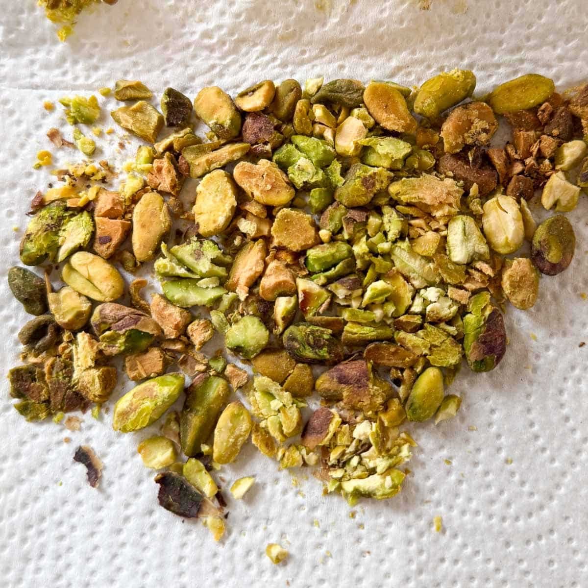 crushed pistachios on paper towel.