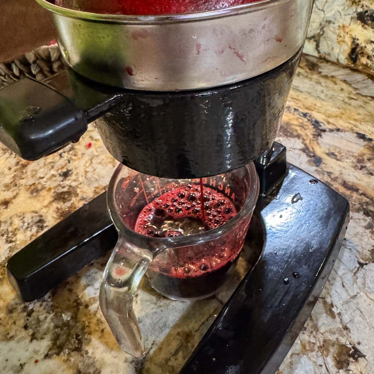 juicing pomegranates.
