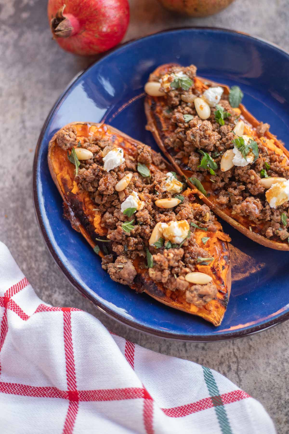 roasted sweet potatoes topped with ground lamb