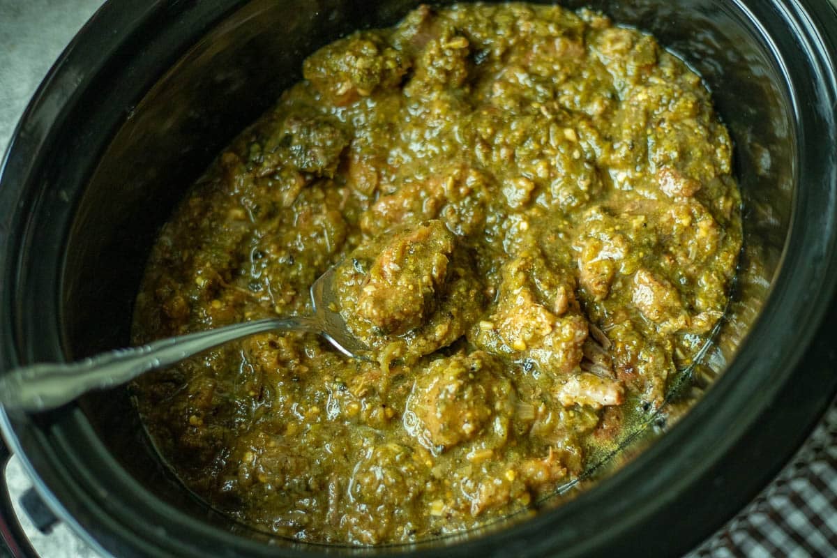 pork chili verde cooked low and slow in a crock pot