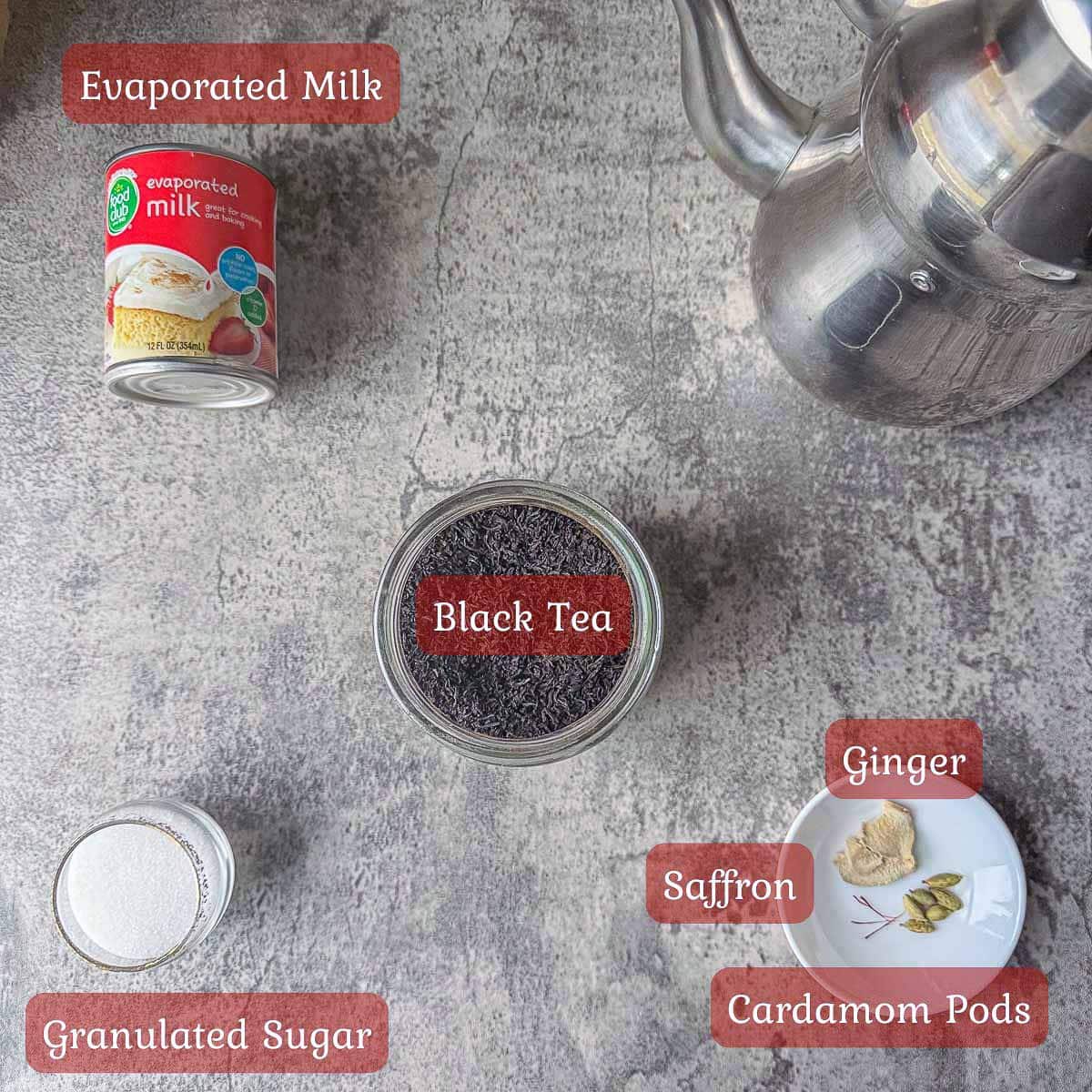 karak tea recipe ingredients including black tea, evaporate mlik, spices, and sugar