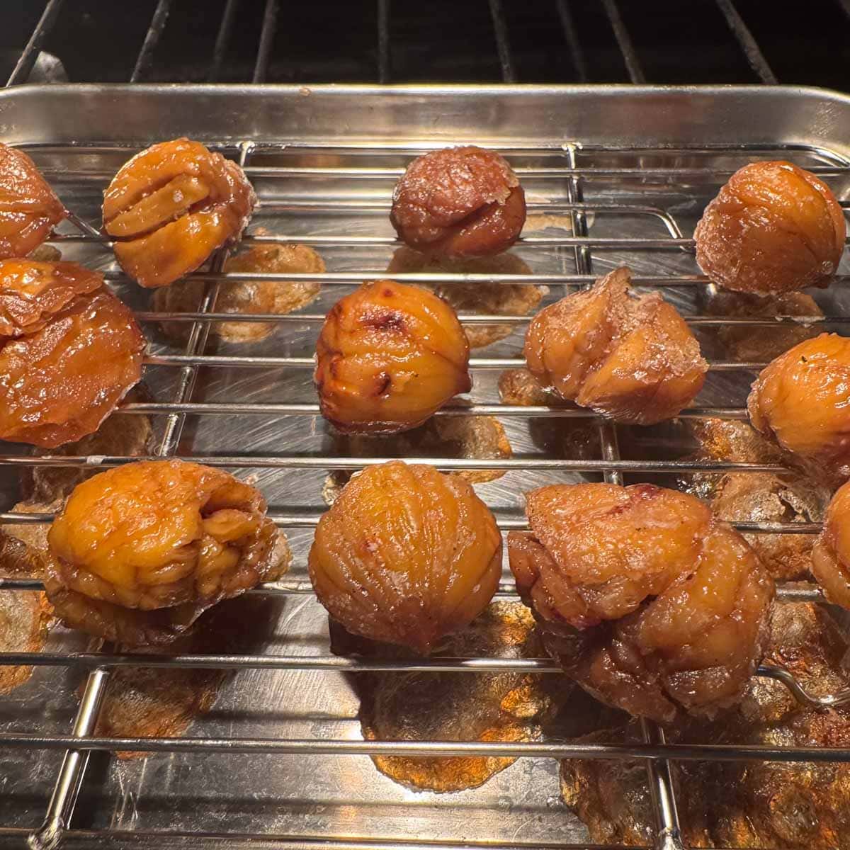 marron glacé on a pan with a rack.