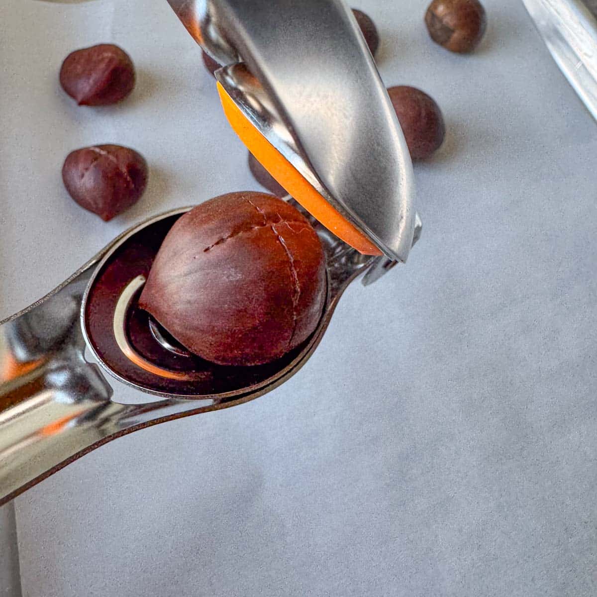 chestnuts being scored