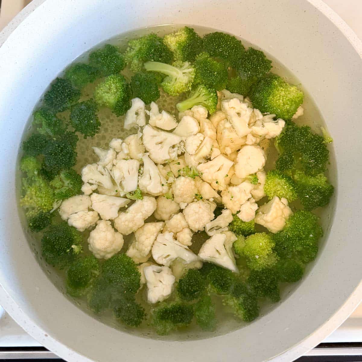 broccoli and cauliflower being blanched together.