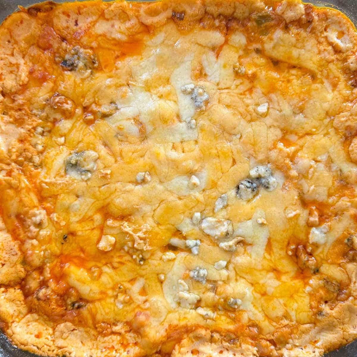 cheese after melting over buffalo dip.