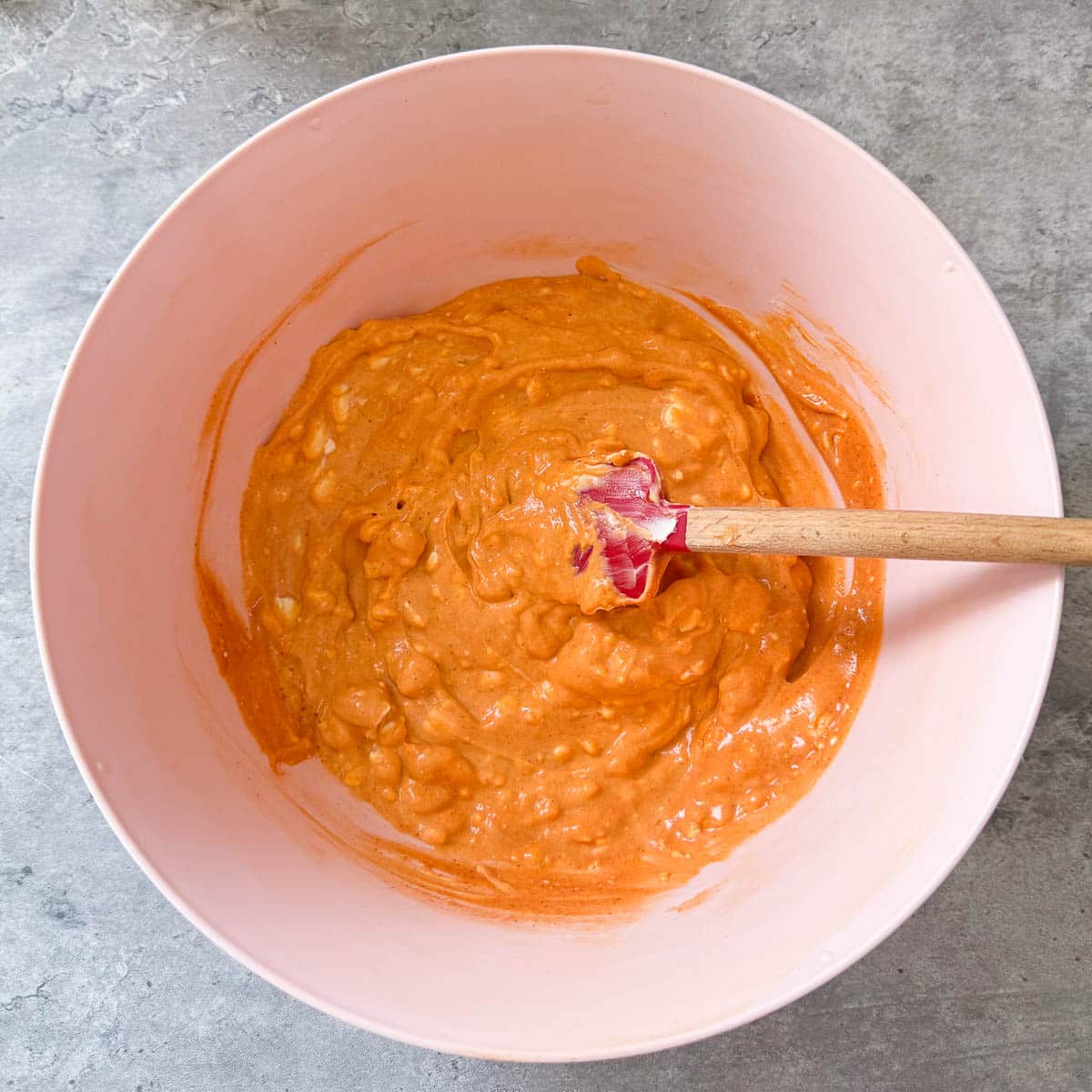 cream cheese and hot sauce mixed in bowl.