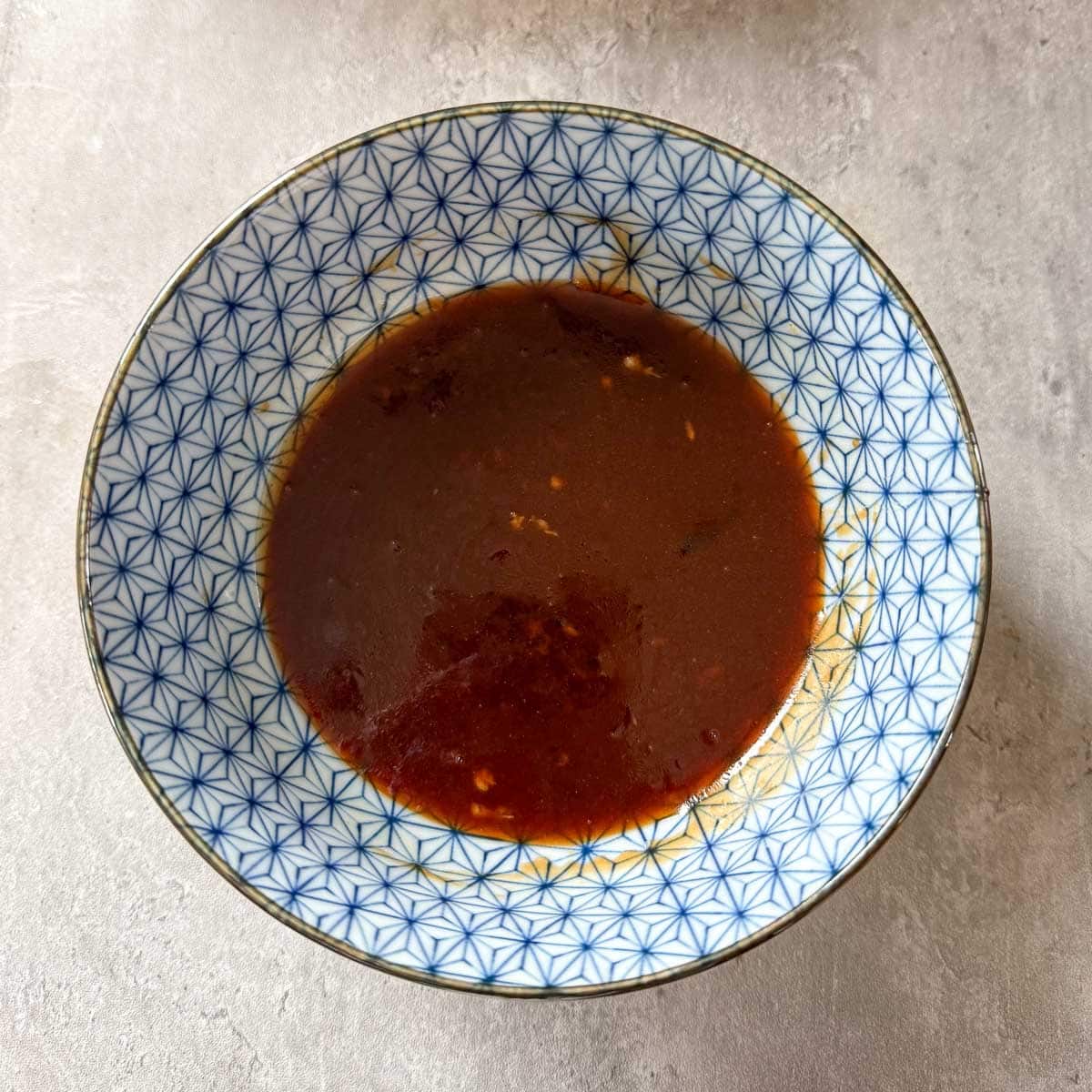 sticky sesame chicken sauce in bowl.