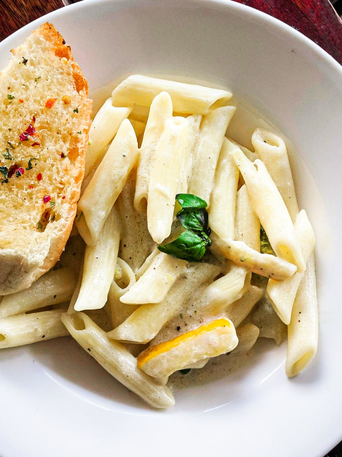 penne in bechamel-based alfredo sauce.