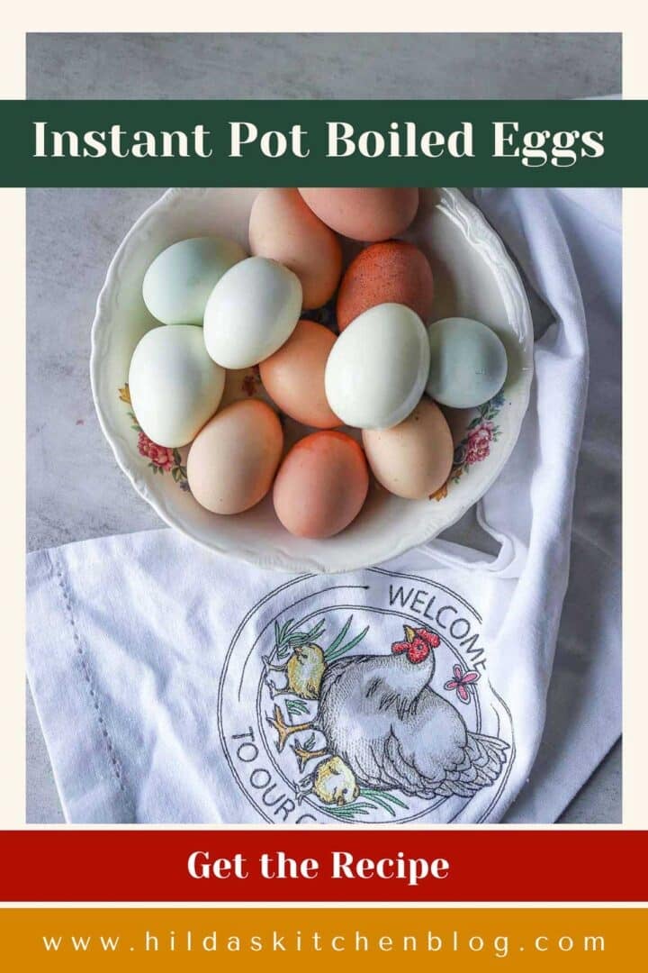 colorful boiled eggs in a white plate with a white towel around it