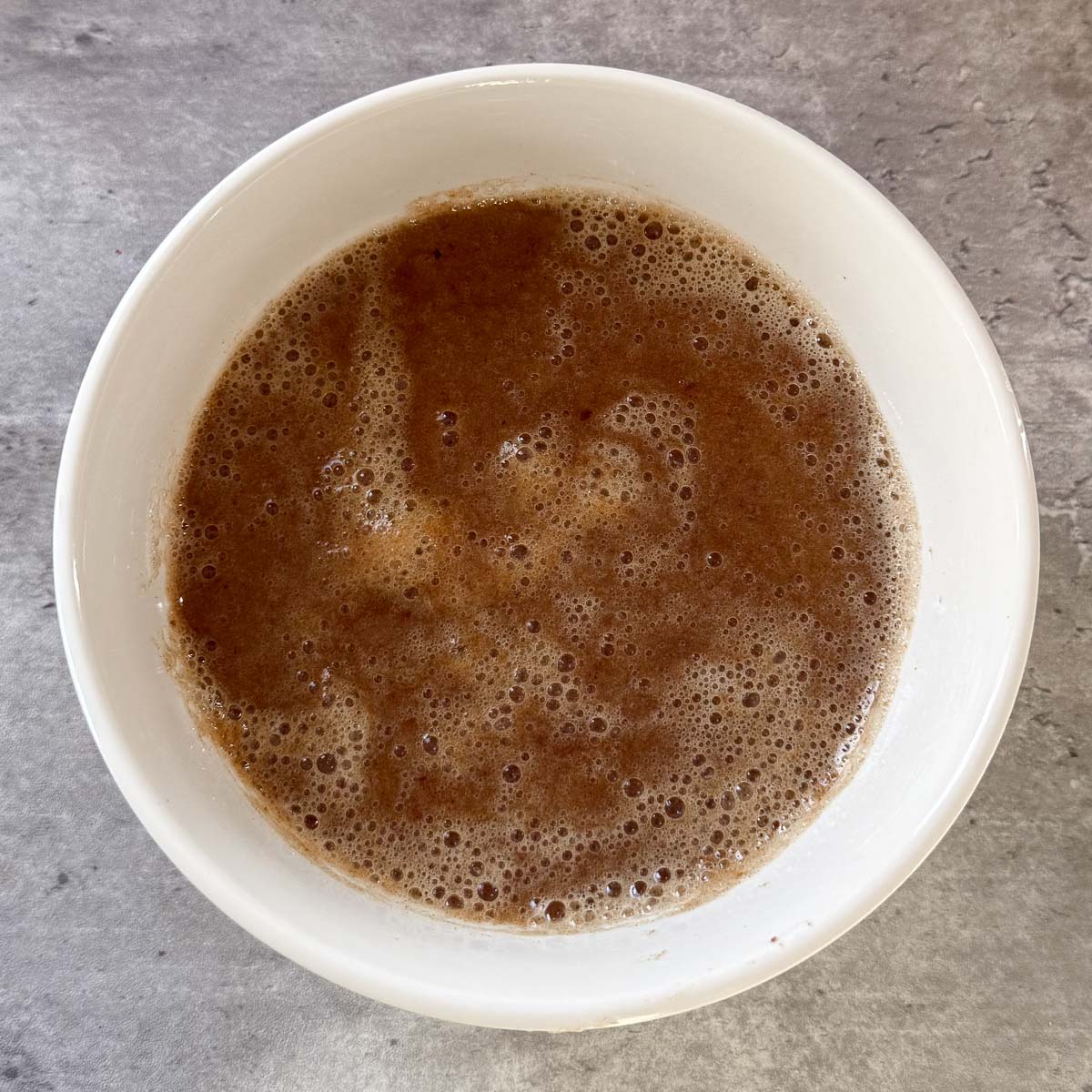 blended dates in bowl.