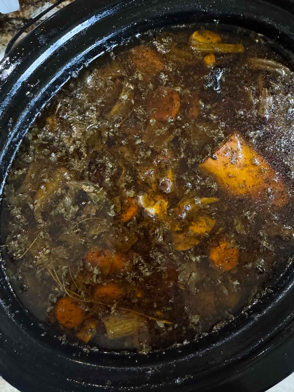 slow cooker full of beef bone broth