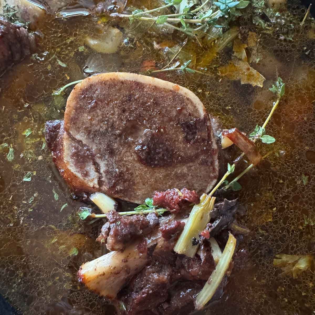 beef bone broth ingredients in a slow cooker