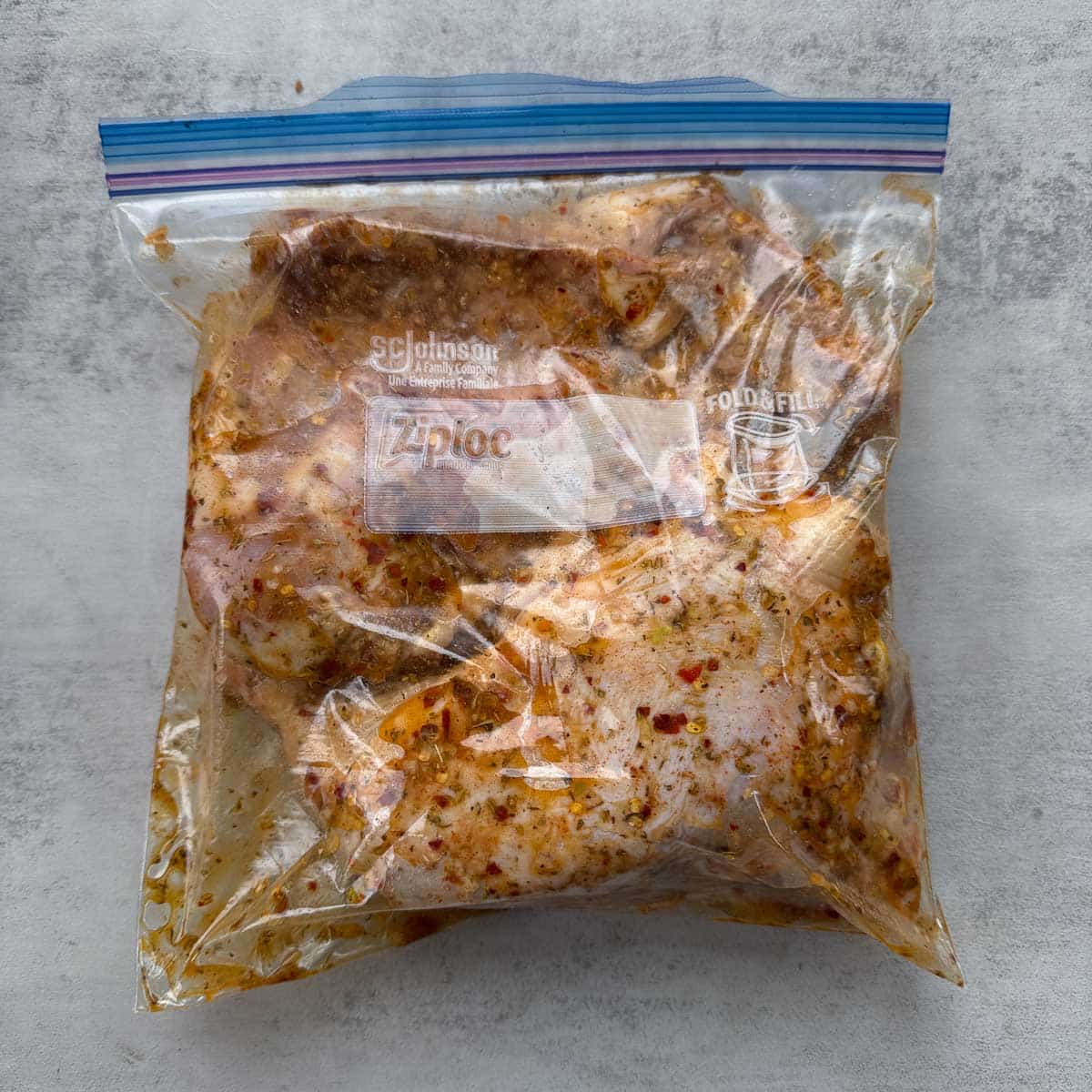 marinated chicken in a ziplock bag