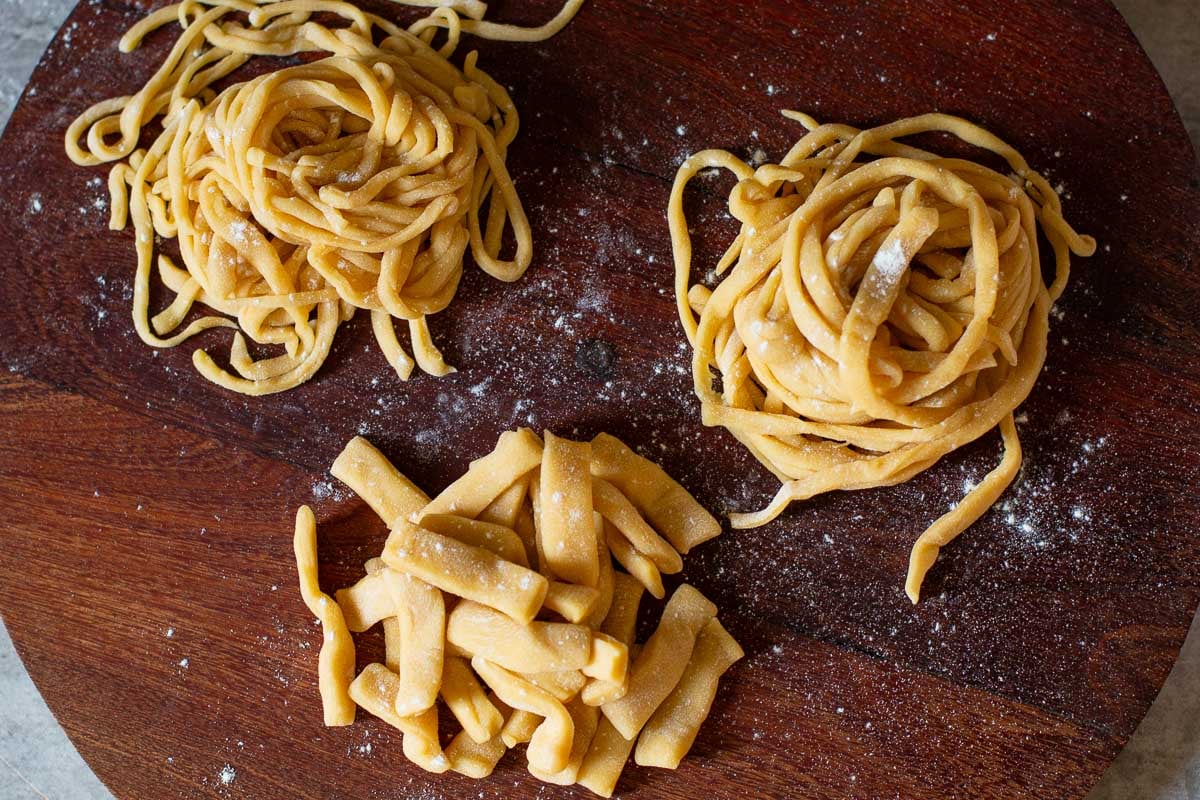 homemade egg noodles cut into three shapes: short & thick noodles, medium width noodles, and thin, delicate noodles.