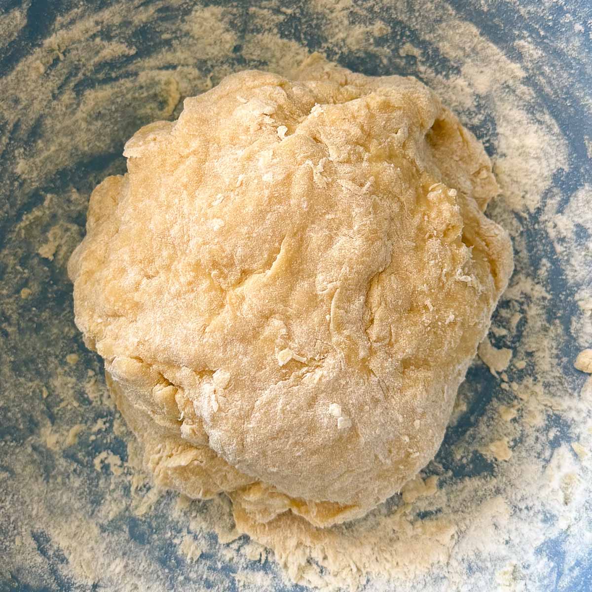 shaggy dough ball in bowl.