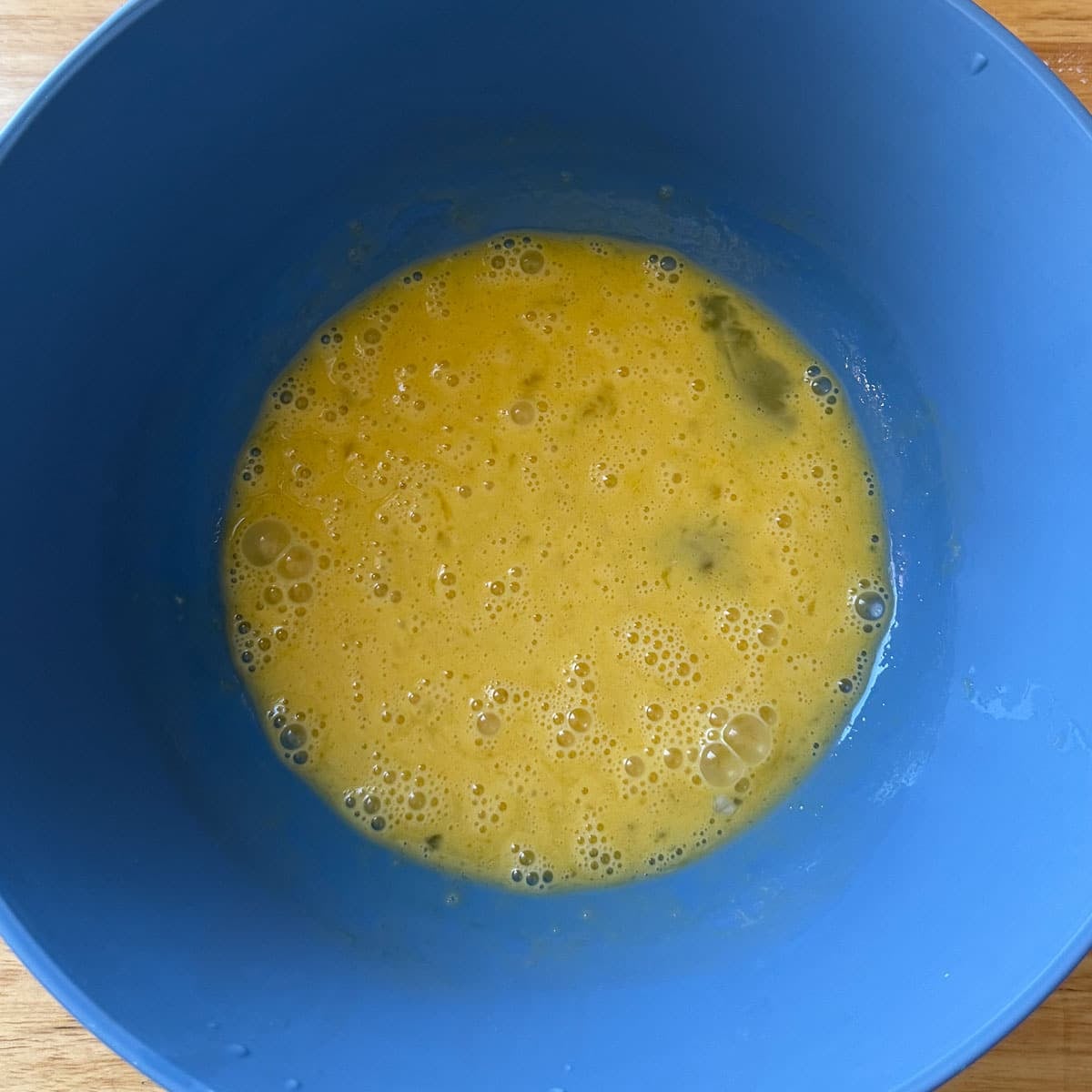 liquid ingredients mixed in a bowl.