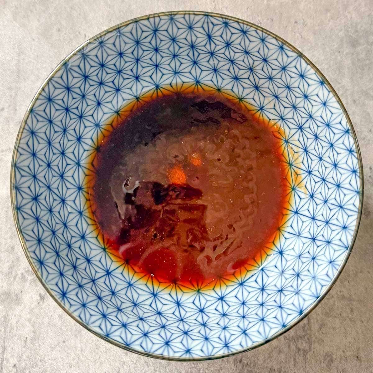 bbq sauce mixture ingredients in bowl before mixing.