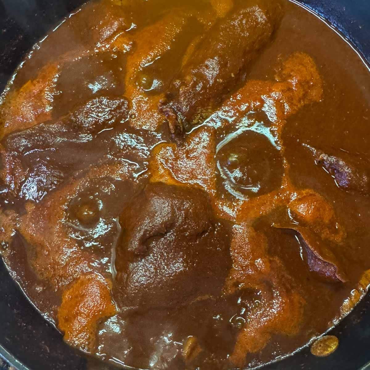 meat simmering in chile sauce