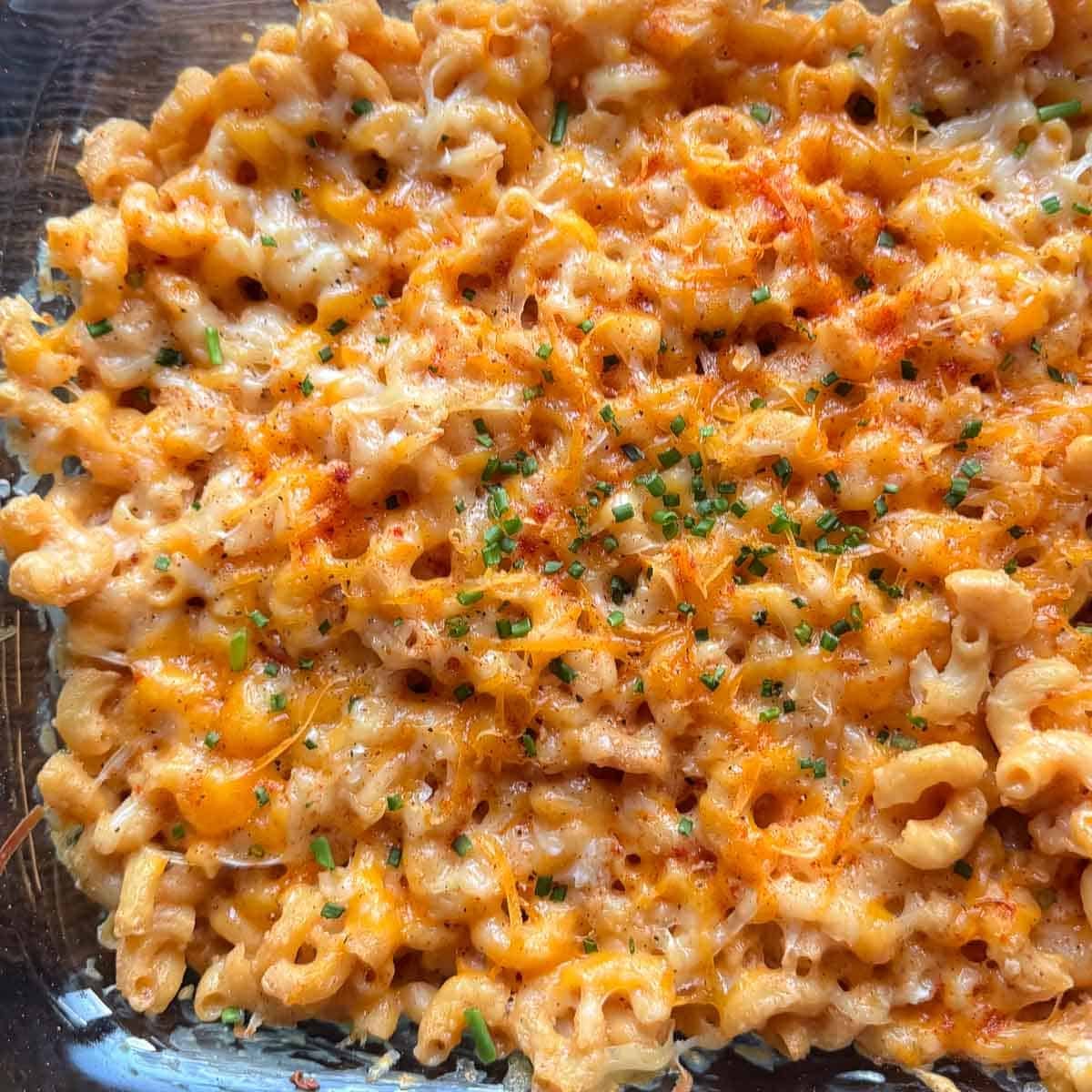 baked high protein macaroni and cheese spread in sheet pan.