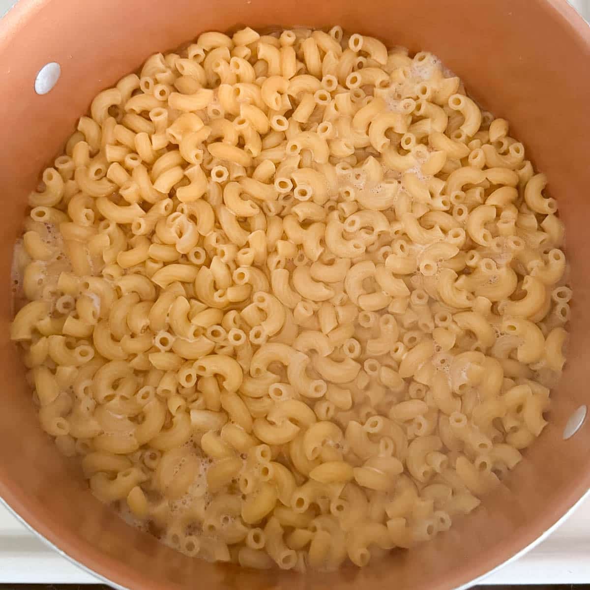 fully cooked high protein macaroni noodles in pot.