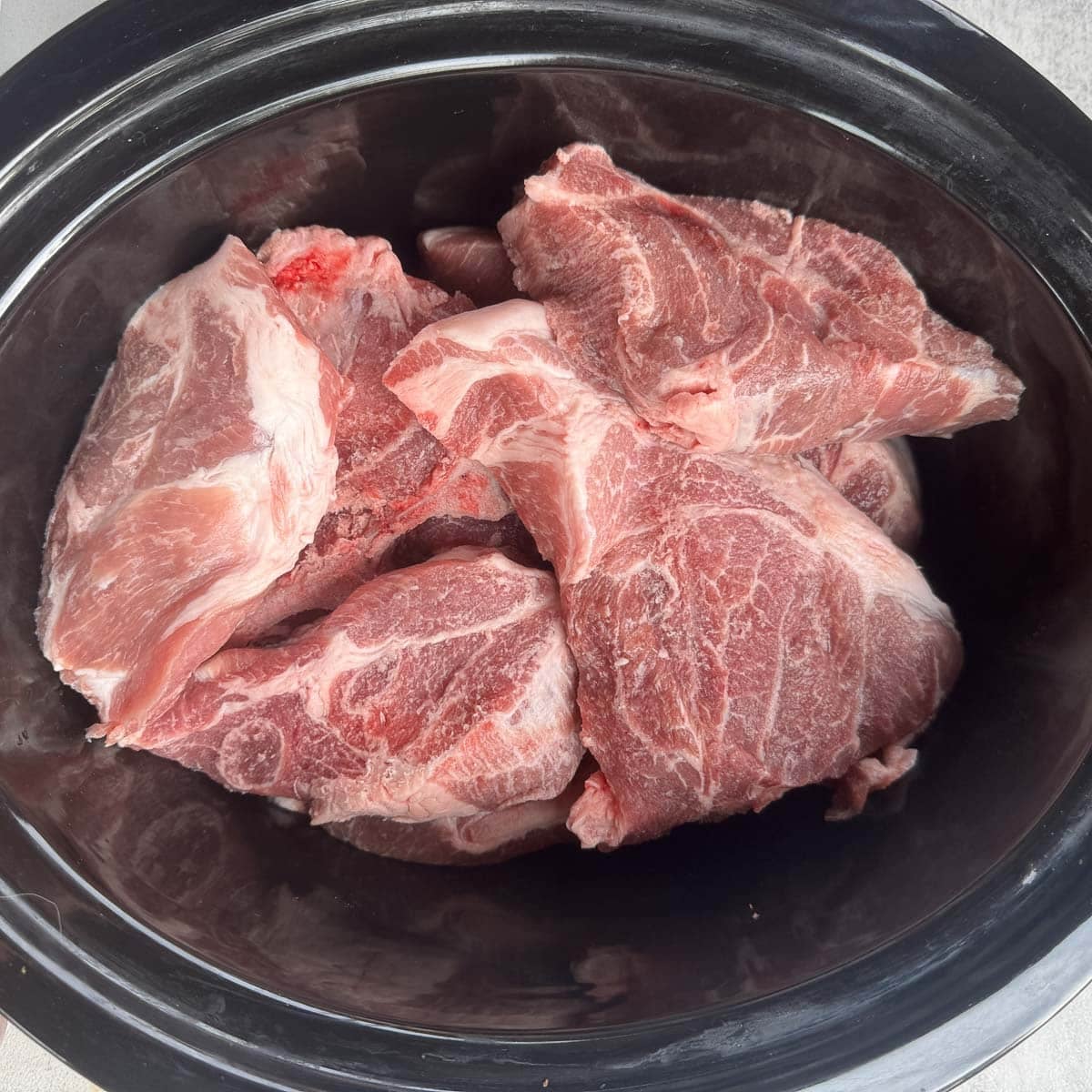 raw country style ribs in a crockpot
