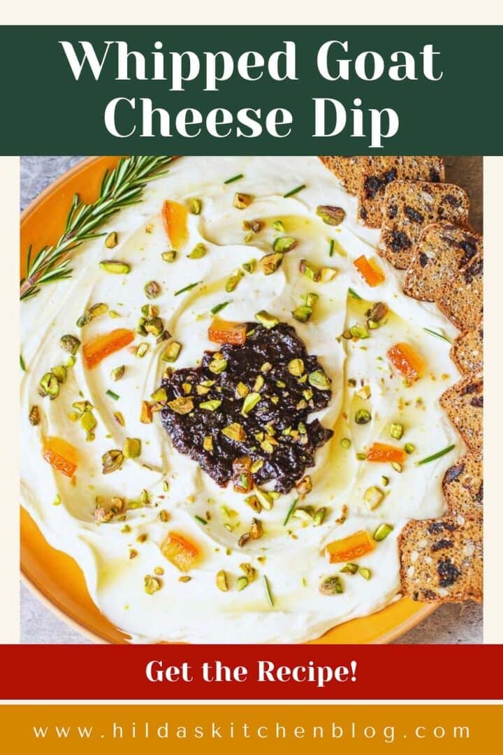 cracker dipped in whipped goat cheese dip.