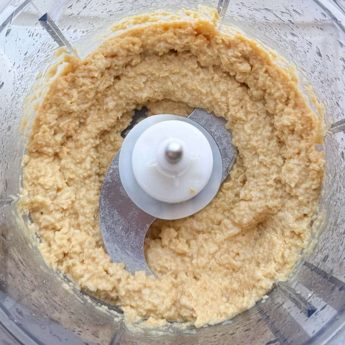 Blended chickpea mixture in food processor.