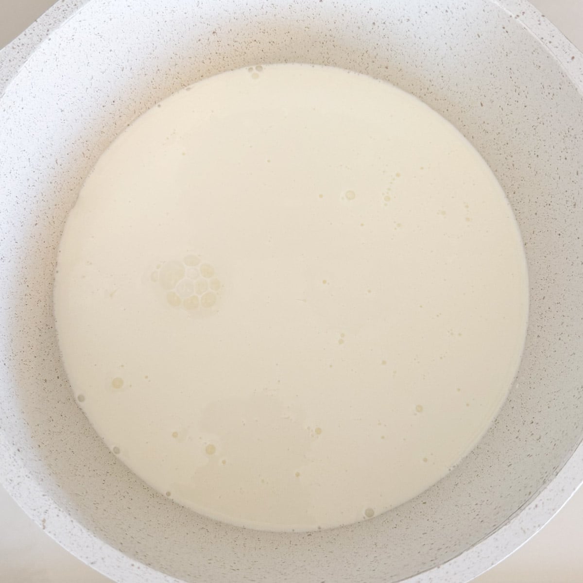cream and sugar in saucepan before boiling.