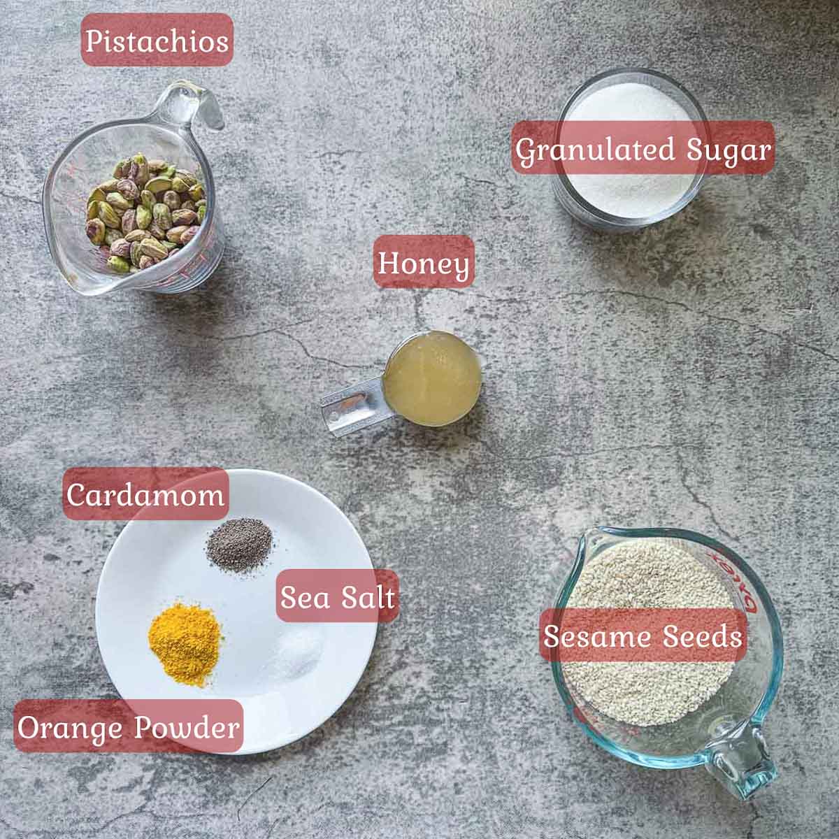 simsim ingredients including sesame seeds, pistachios, sugar, honey, and spices 