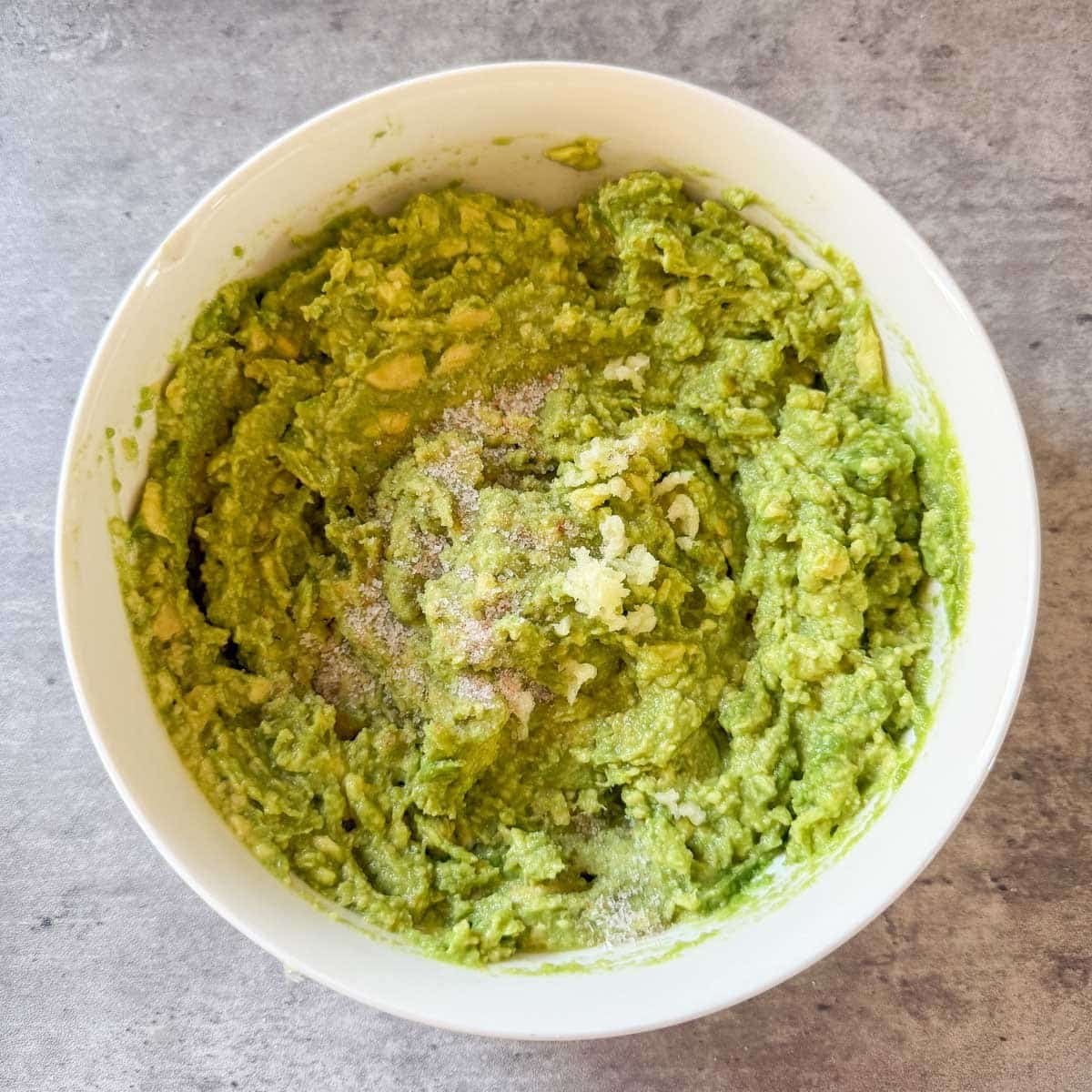 garlic and salt added to guacamole.