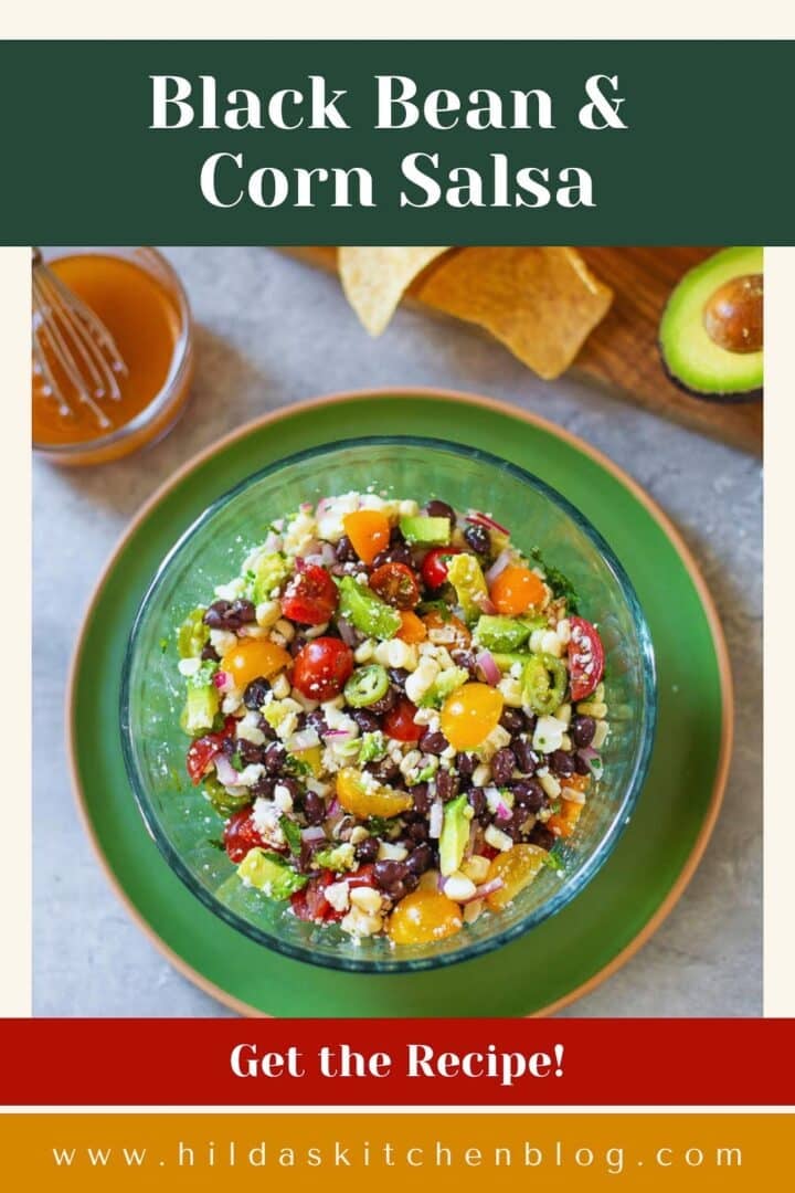 black bean and corn salsa beside vinaigrette, chips, avocado.