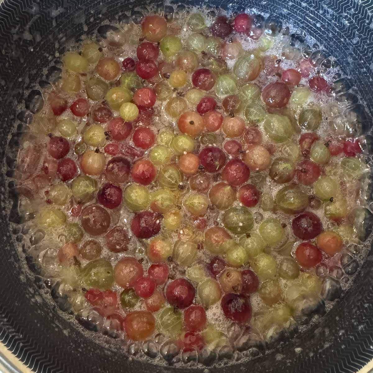 gooseberries cooking in syrup