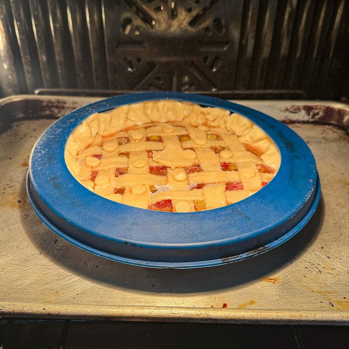 unbaked gooseberry pie in the oven