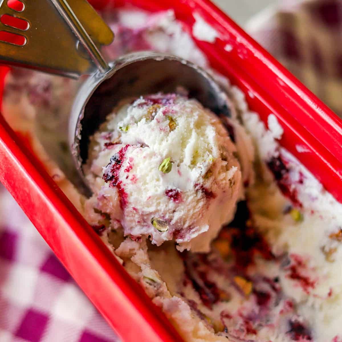 huckleberry ice cream in a red tub