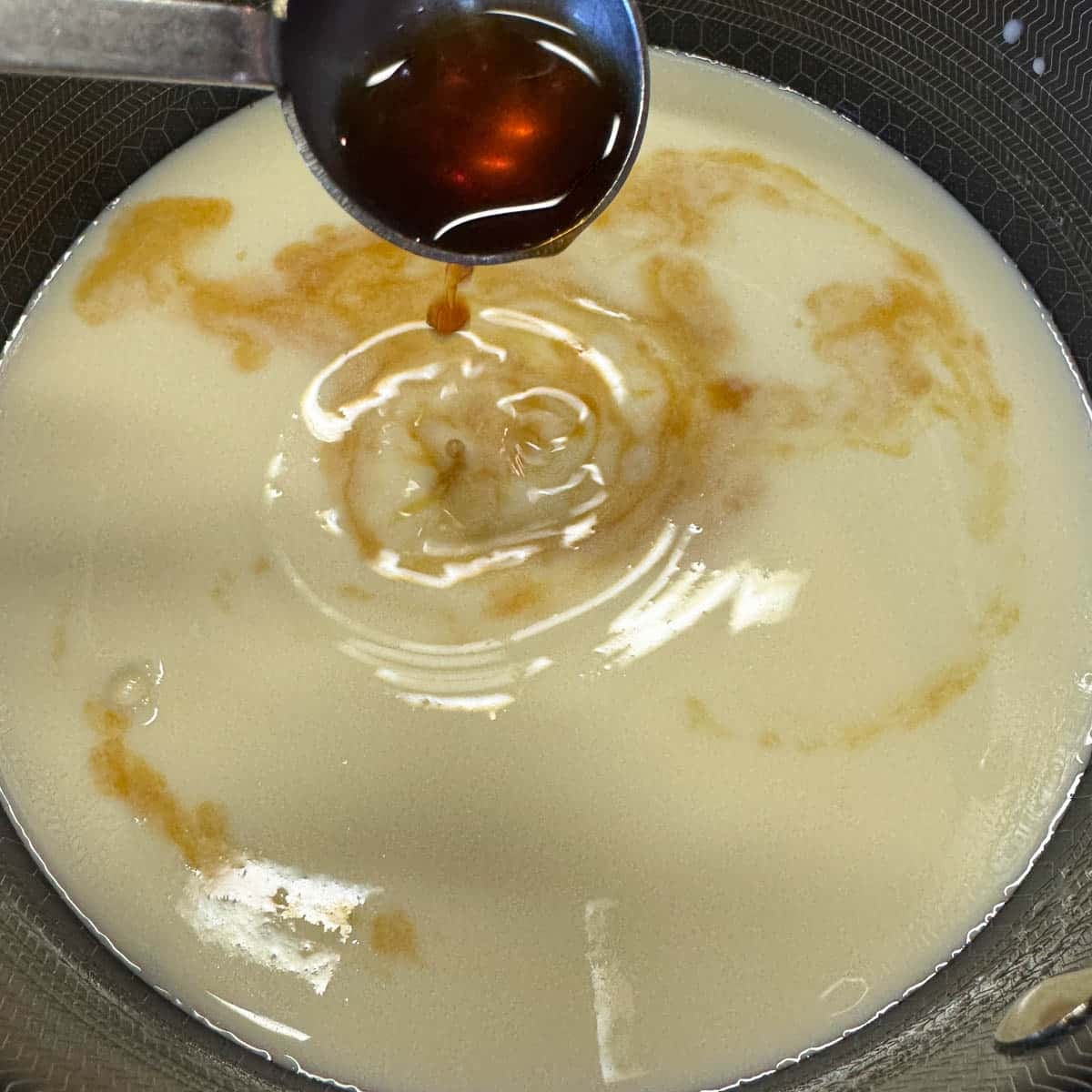 vanilla being added to ice cream base