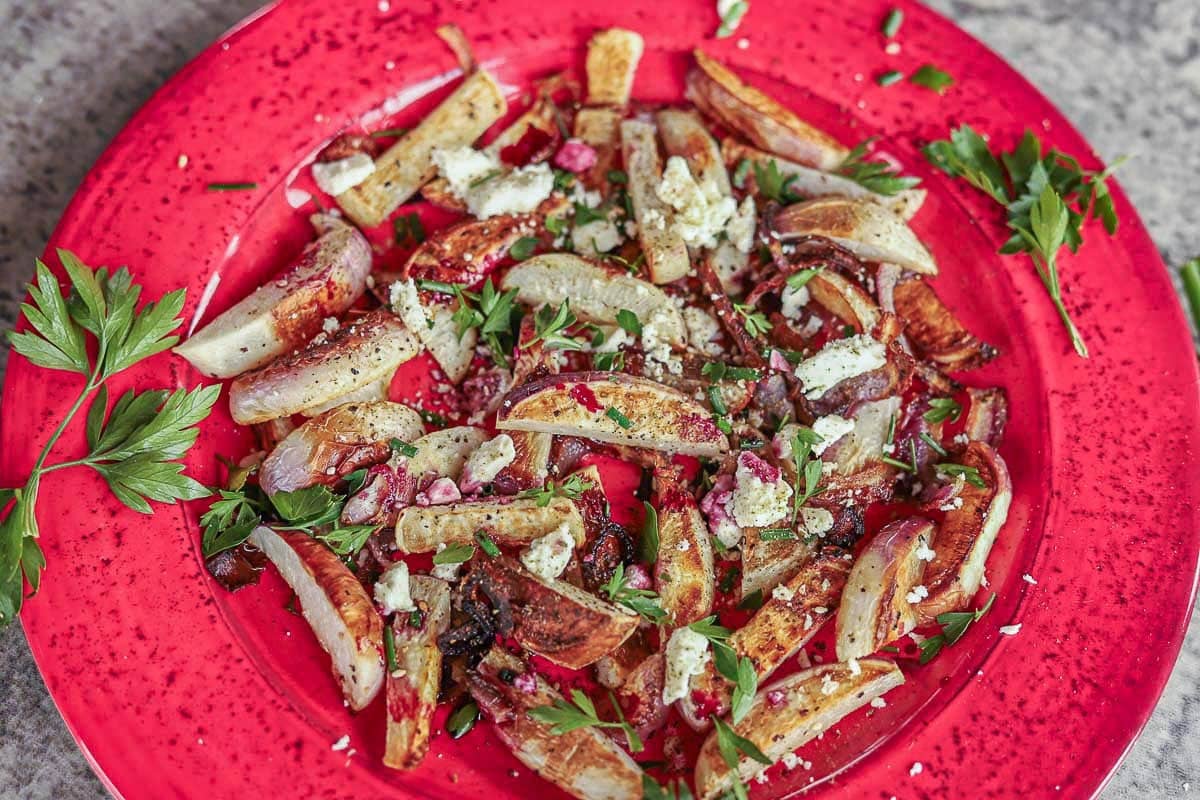roasted turnips drizzled with pomegranate sauce, feta, and chopped parsley