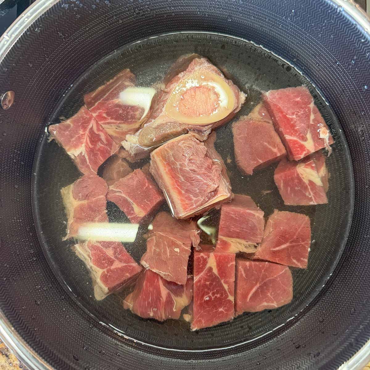 meat in a pot with water