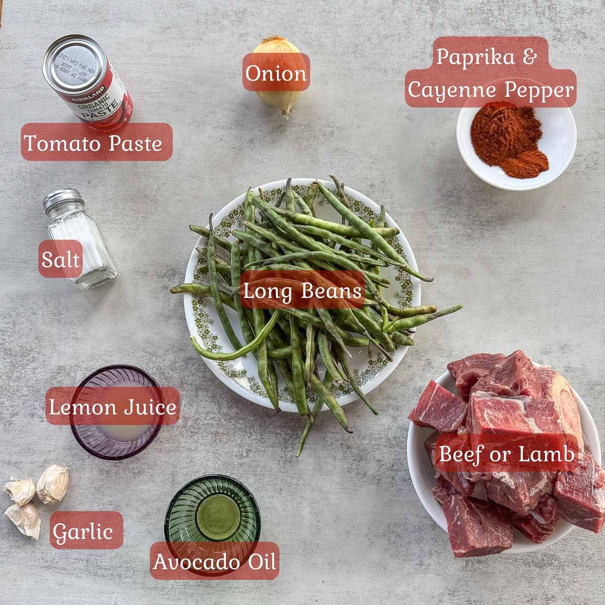 iraqi lobia recipe ingredients including long beans, meat, tomato paste, spices, onion