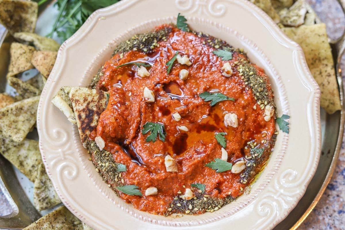 muhammara dip in a white bowl
