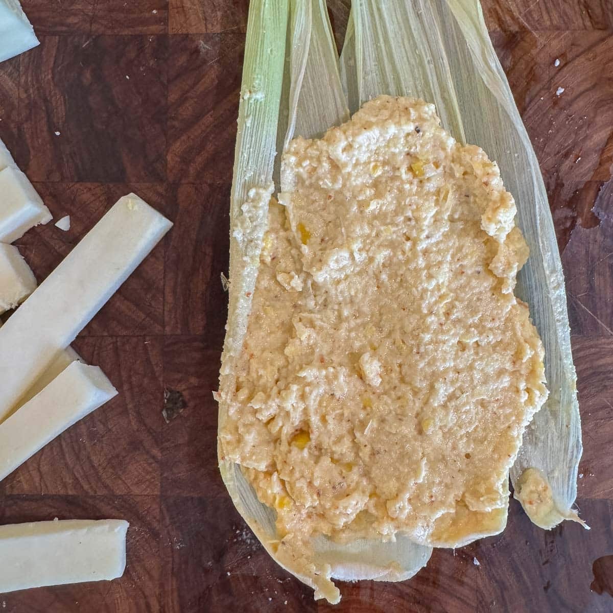 corn masa on corn husks