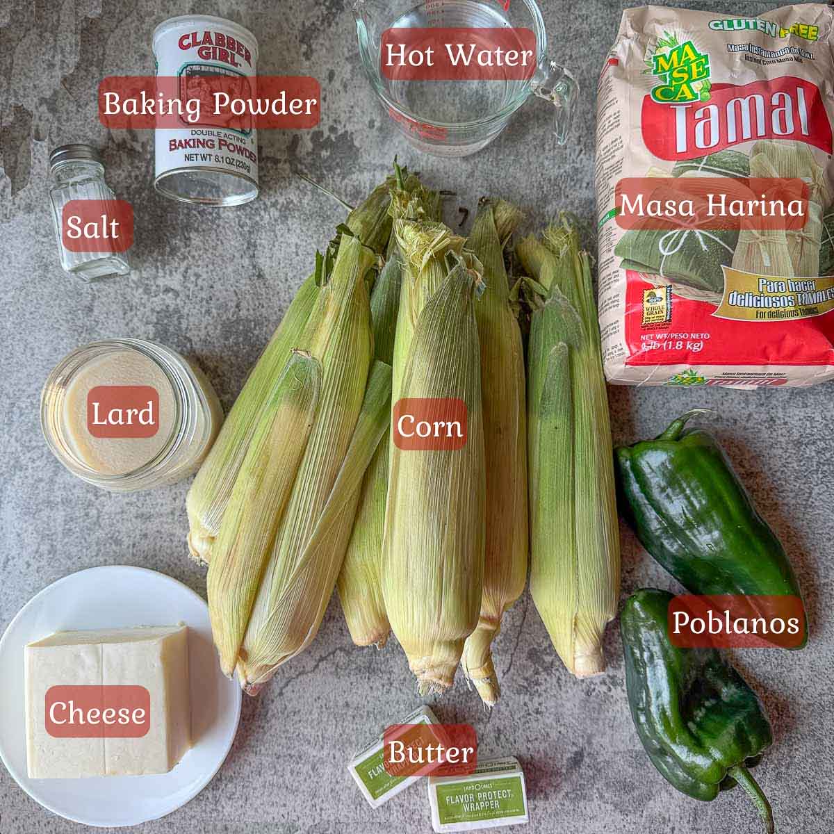 corn tamales ingredients including corn, masa harina, poblanos, and cheese.