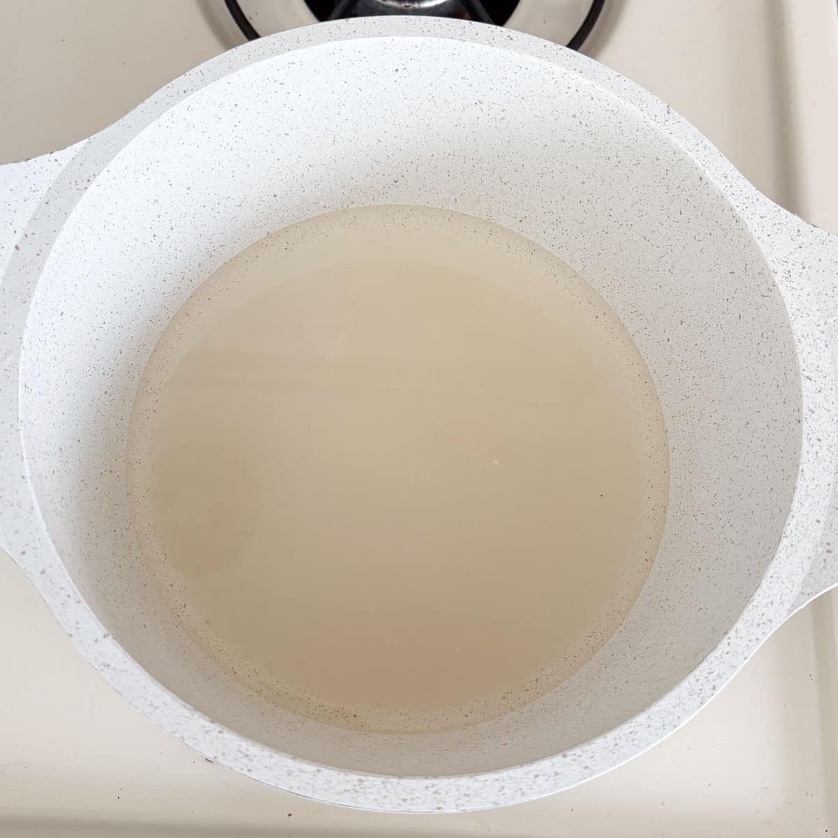 sugar and water in pot before boiling.