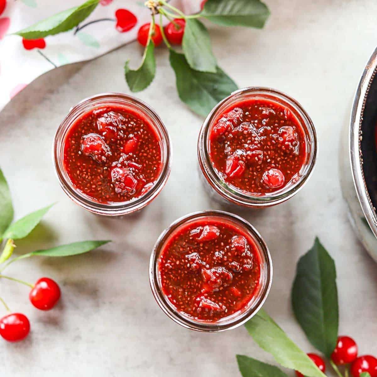 sour cherry chia seed jam in 3 jars