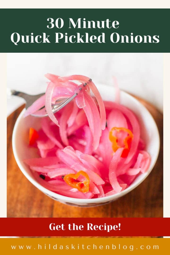 fork holding quick pickled red onions over bowl.