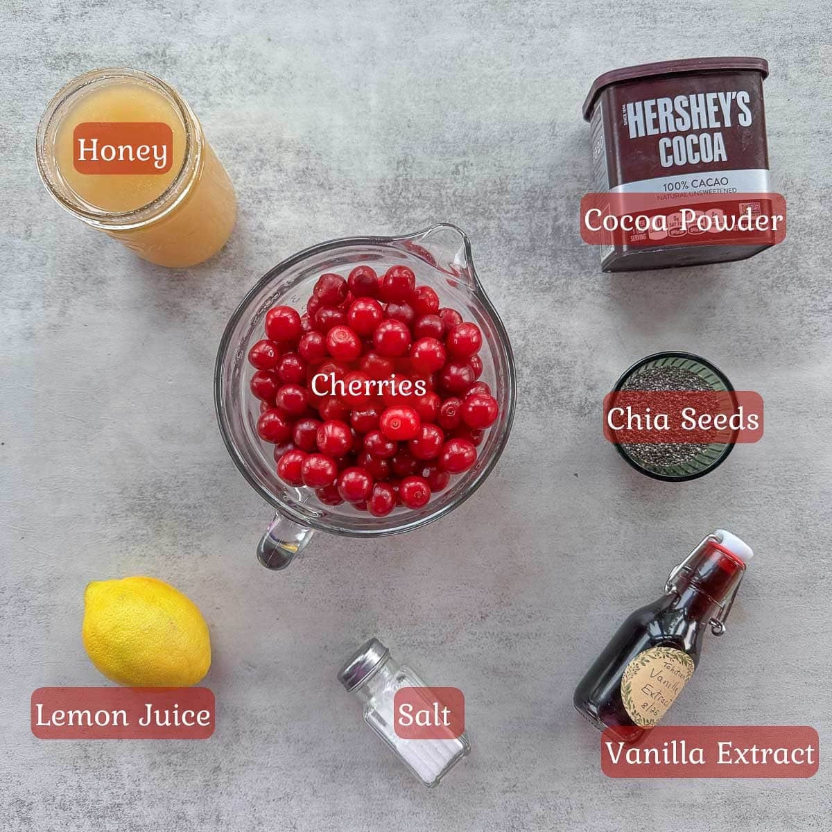 sour cherry jam ingredients including cherries, honey, chia seeds