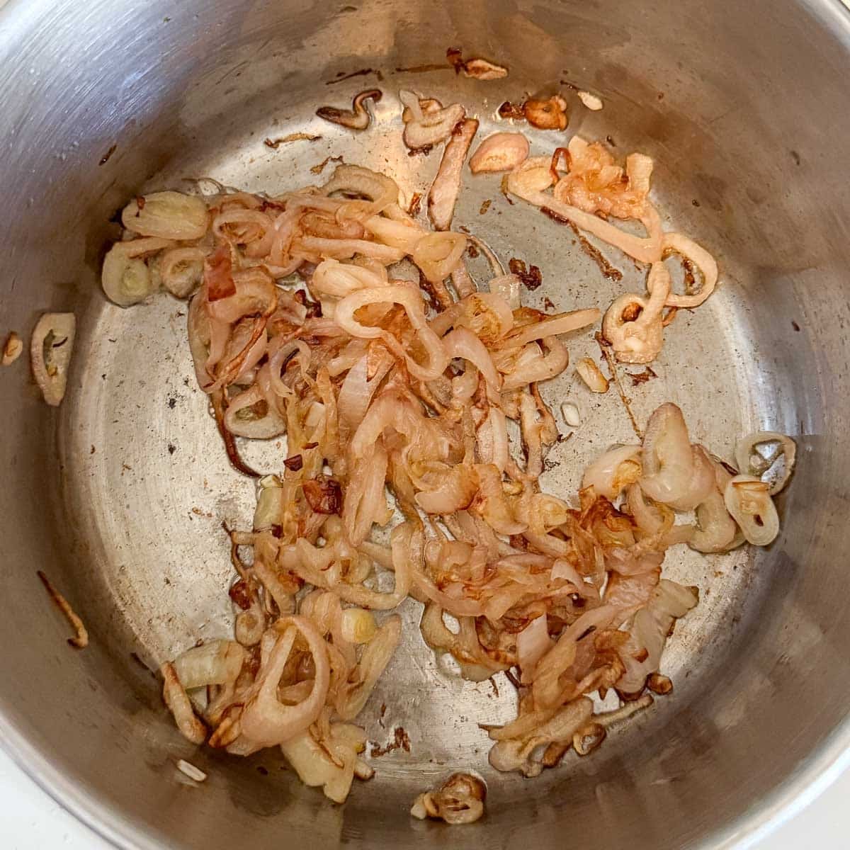 caramelized shallots in saucepan.