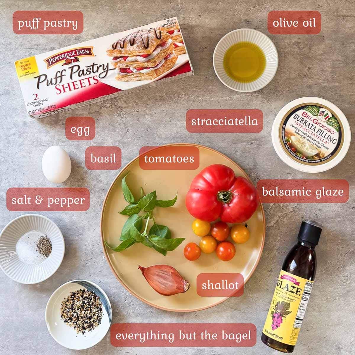 tomato tart using puff pastry ingredients (veggies, cheese, seasonings, etc.)