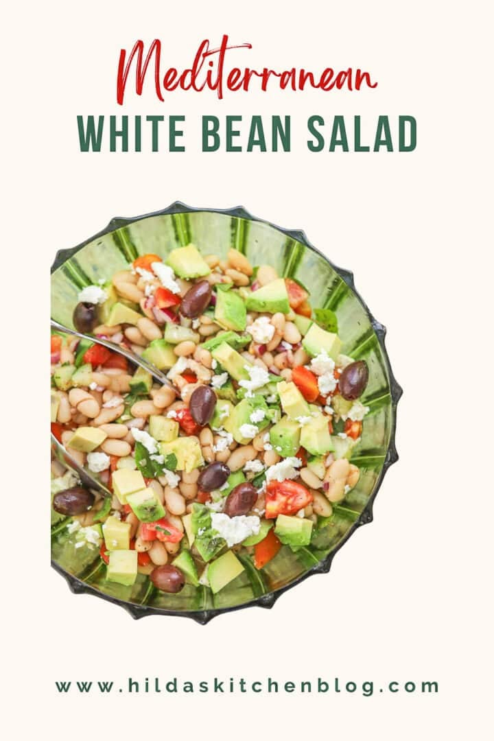 white bean salad in a green bowl