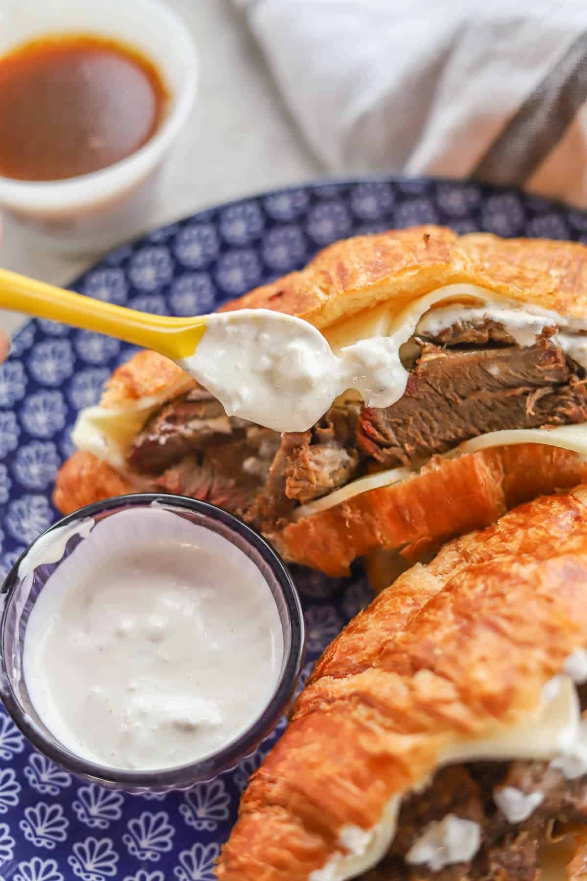 two sandwiches with horseradish sauce