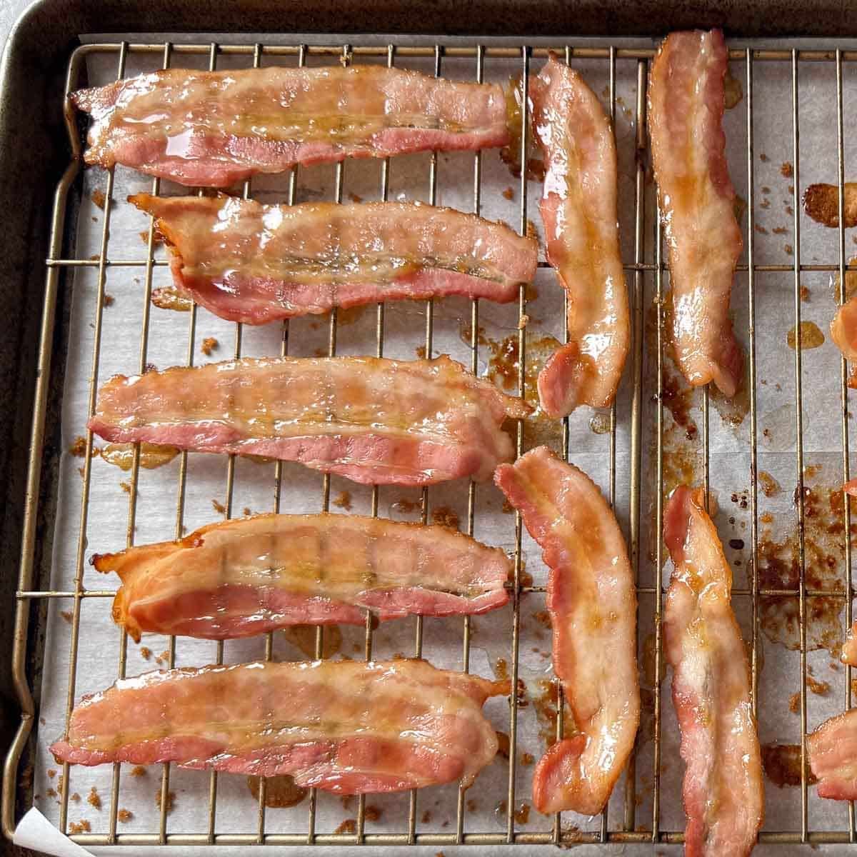 melted brown sugar on bacon strips.